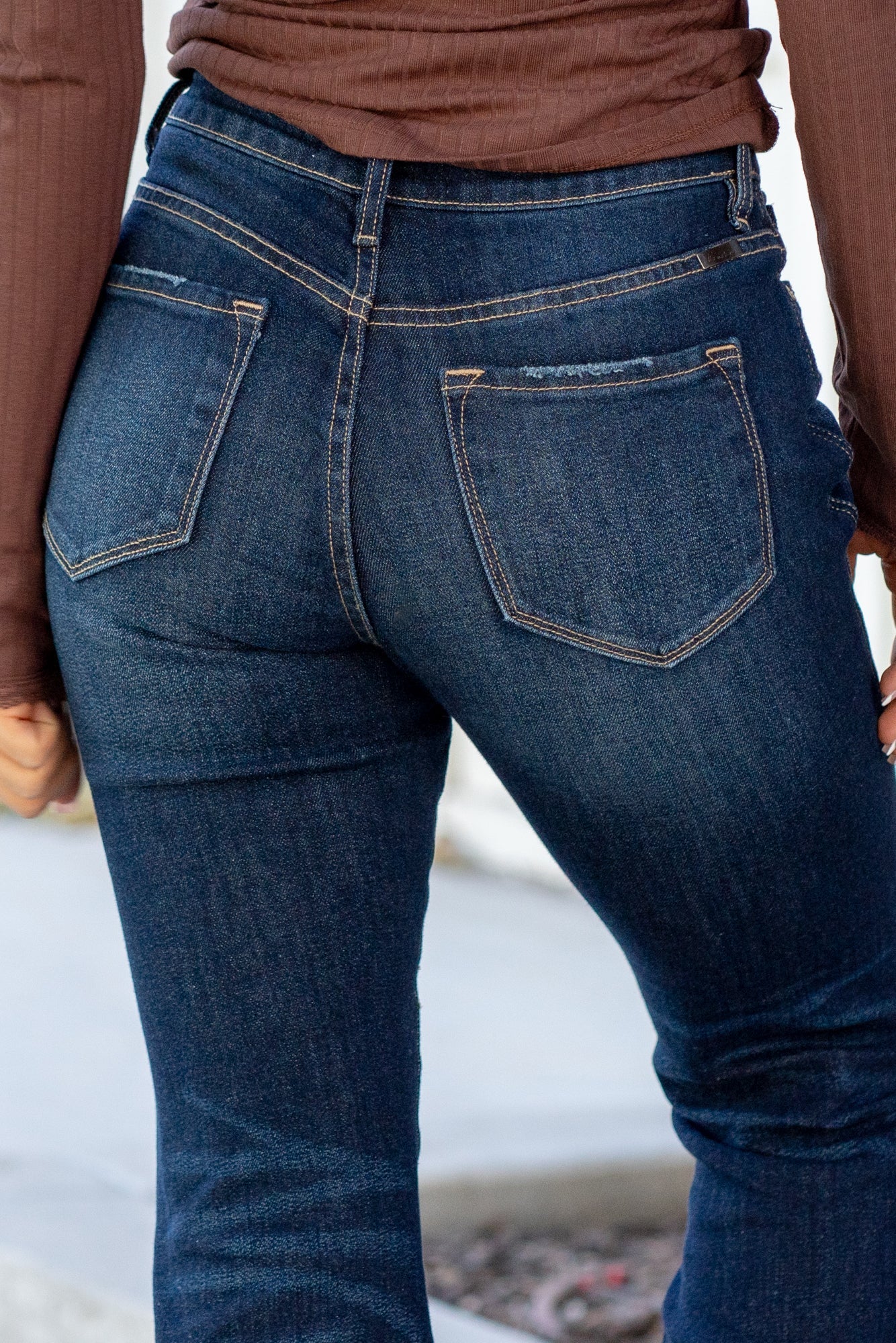 KanCan Jeans  These high-rise flare jeans in a dark stone wash offer comfort stretch and a clean, non-distressed finish with a zip fly. Perfect for a polished and timeless look. Color: Dark Blue Cut: Flare, 34" Inseam*  Rise: High-Rise, 10.5" Front Rise* Material: 99.3% COTTON, 0.7% SPANDEX Stitching: Classic Fly: Zipper Style #: KC7340D *Measured on the smallest size, measurements may vary by size.