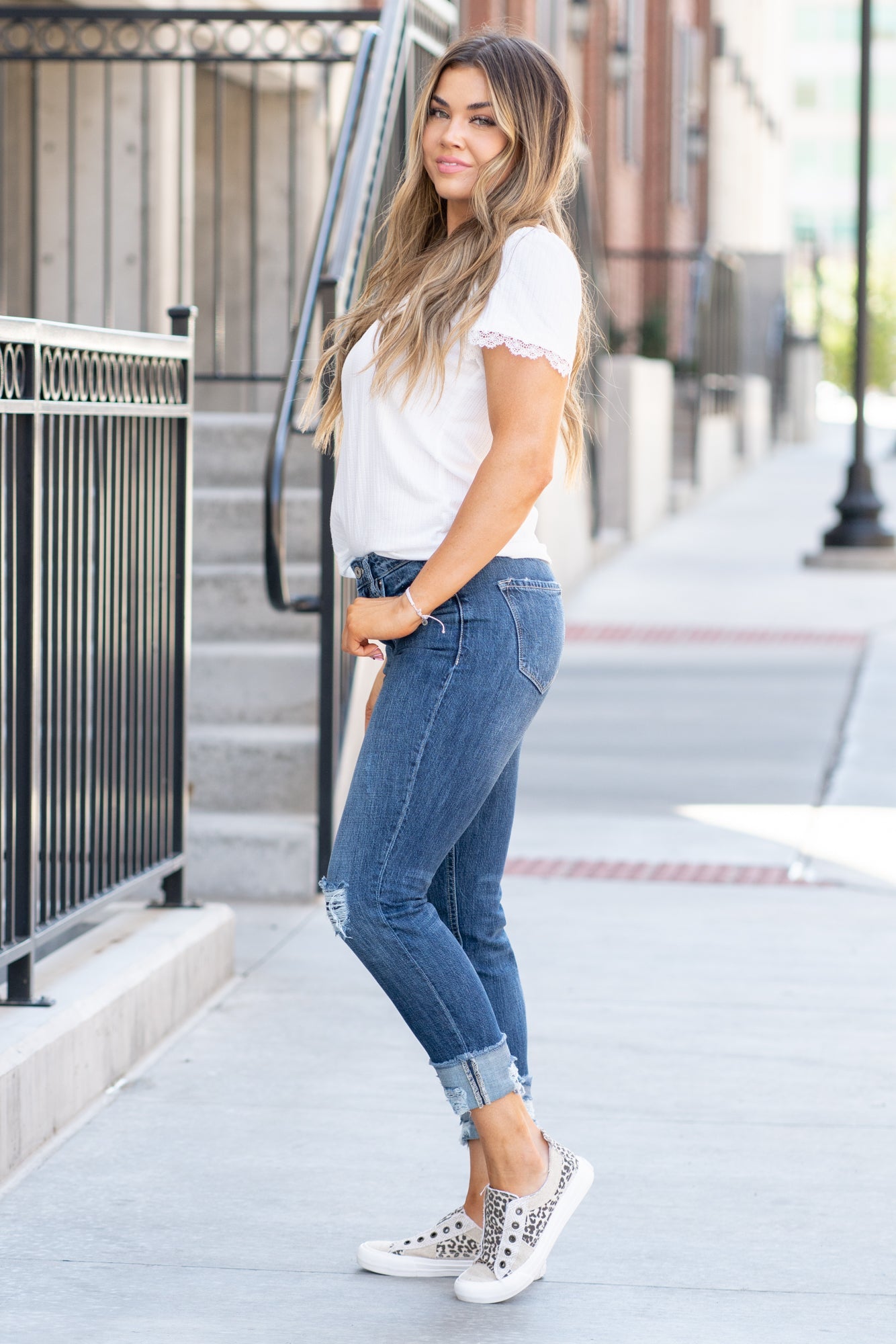 KanCan Jeans  These boyfriend jeans will become your go-to! Pair these boyfriend/mom fit with booties and a tee for an easy fall look.  Color: Medium Blue Wash Cut: Straight Fit, 25" Inseam Cuffed*  Rise: High-Rise, 9.5" Front Rise* Material: 100% Cotton Fly: Zipper Style #: KC8559M Contact us for any additional measurements or sizing.