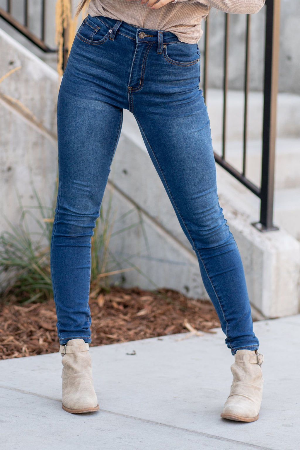 KanCan Jeans Collection: Core Style  Color: Dark Blue Wash Cut: Skinny, 30" Inseam* Rise: High Rise, 10.5" Front Rise* COTTON 66%, POLYESTER 33%, SPANDEX 1% Stitching: Classic Fly: Zipper  Style #: KC11253D Contact us for any additional measurements or sizing.    *Measured on the smallest size, measurements may vary by size. 