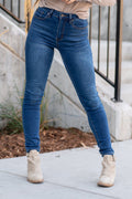 KanCan Jeans Collection: Core Style  Color: Dark Blue Wash Cut: Skinny, 30" Inseam* Rise: High Rise, 10.5" Front Rise* COTTON 66%, POLYESTER 33%, SPANDEX 1% Stitching: Classic Fly: Zipper  Style #: KC11253D Contact us for any additional measurements or sizing.    *Measured on the smallest size, measurements may vary by size. 