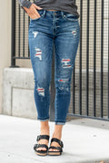 KanCan Jeans  Collection: Core Collection Style Name: Buffalo Plaid Color: Dark Wash Cut: Ankle Skinny, 27" Inseam Rise: Mid-Rise, 8.5" Front Rise 92% Cotton 6% Polyester 2% Spandex Fly: Zipper  Style #: KC6310D Contact us for any additional measurements or sizing.  *Measured on the smallest size, measurements may vary by size.  Sarah wears a size 25 in jeans, a small in tops, and 8 in shoes. She is wearing size 25 in these jeans.