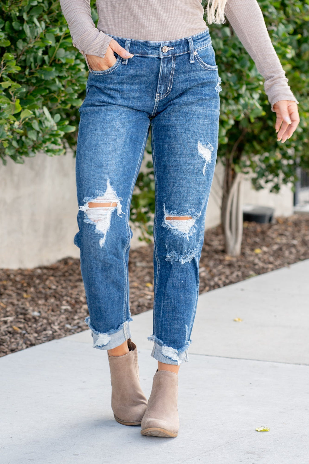KanCan Jeans  These mid-rise boyfriend jeans hit at exactly the right spot on your waist and with some spandex, these will stretch as you wear and get super comfy!  Color: Dark Blue Wash Cut: Cuffed Boyfriend, 26" Inseam* Rise: Mid-Rise, 9.25" Front Rise* 99% COTTON, 1% SPANDEX Stitching: Classic Fly: Zipper Style #: KC8652D Contact us for any additional measurements or sizing.  