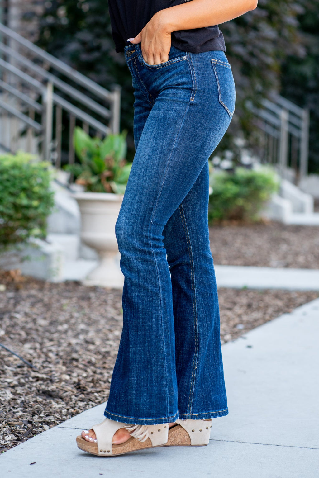 KanCan Jeans Collection: Core Style    Color: Dark Wash Cut: Flare, 33.75" Inseam* Rise: Mid-Rise, 9" Front Rise* 54% 54% COTTON 34% Rayon 10% POLYESTER 2% SPANDEX Fly: Zipper Style #: KC6102LOH Contact us for any additional measurements or sizing.    *Measured on the smallest size, measurements may vary by size.      Cas is 5'7" and wears a size 25 in jeans, a small in tops, and 8 in shoes. She is wearing size 25 in these jeans. 