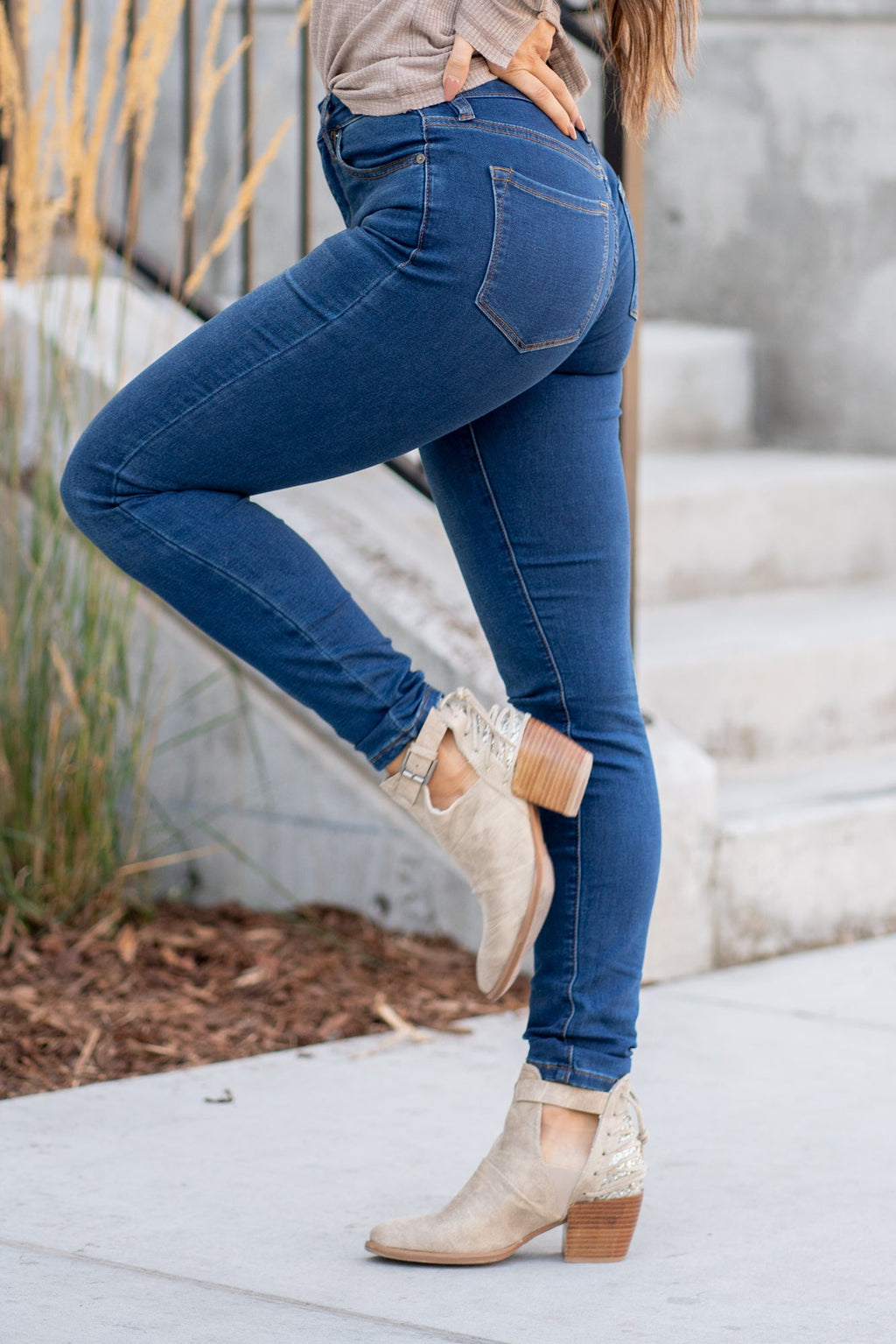 KanCan Jeans Collection: Core Style  Color: Dark Blue Wash Cut: Skinny, 30" Inseam* Rise: High Rise, 10.5" Front Rise* COTTON 66%, POLYESTER 33%, SPANDEX 1% Stitching: Classic Fly: Zipper  Style #: KC11253D Contact us for any additional measurements or sizing.    *Measured on the smallest size, measurements may vary by size. 