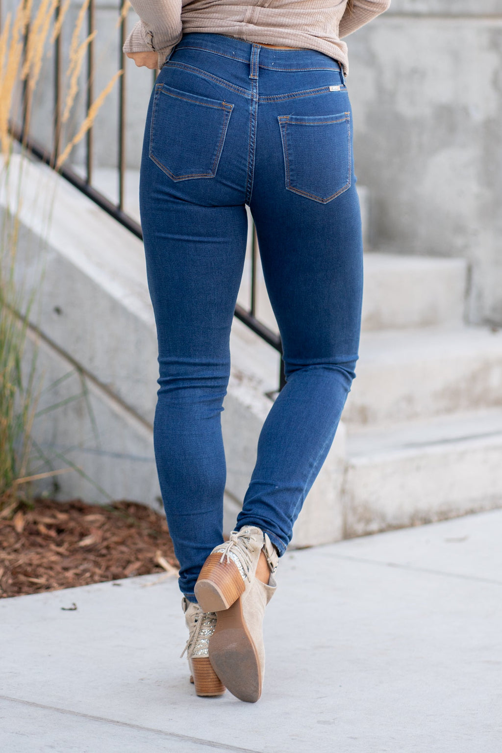 KanCan Jeans Collection: Core Style  Color: Dark Blue Wash Cut: Skinny, 30" Inseam* Rise: High Rise, 10.5" Front Rise* COTTON 66%, POLYESTER 33%, SPANDEX 1% Stitching: Classic Fly: Zipper  Style #: KC11253D Contact us for any additional measurements or sizing.    *Measured on the smallest size, measurements may vary by size. 