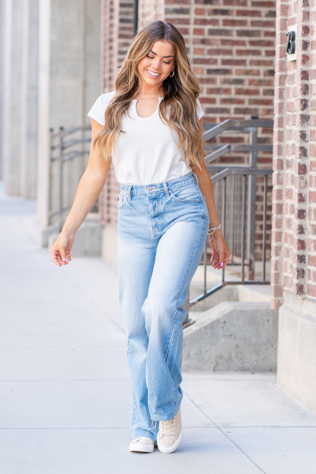 KanCan Jeans  KanCan Rigid Denim  Flare, 32" Inseam  High Rise, 12" Front Rise Light Blue Wash  100% Cotton Fly: Exposed Button Style #: KC8725L Contact us for any additional measurements or sizing.  *Measured on the smallest size, measurements may vary by size.  Jacquelyn wears a size 25 in jeans, a small in tops, and 6.5 in shoes. She is wearing a size 25 in these jeans.