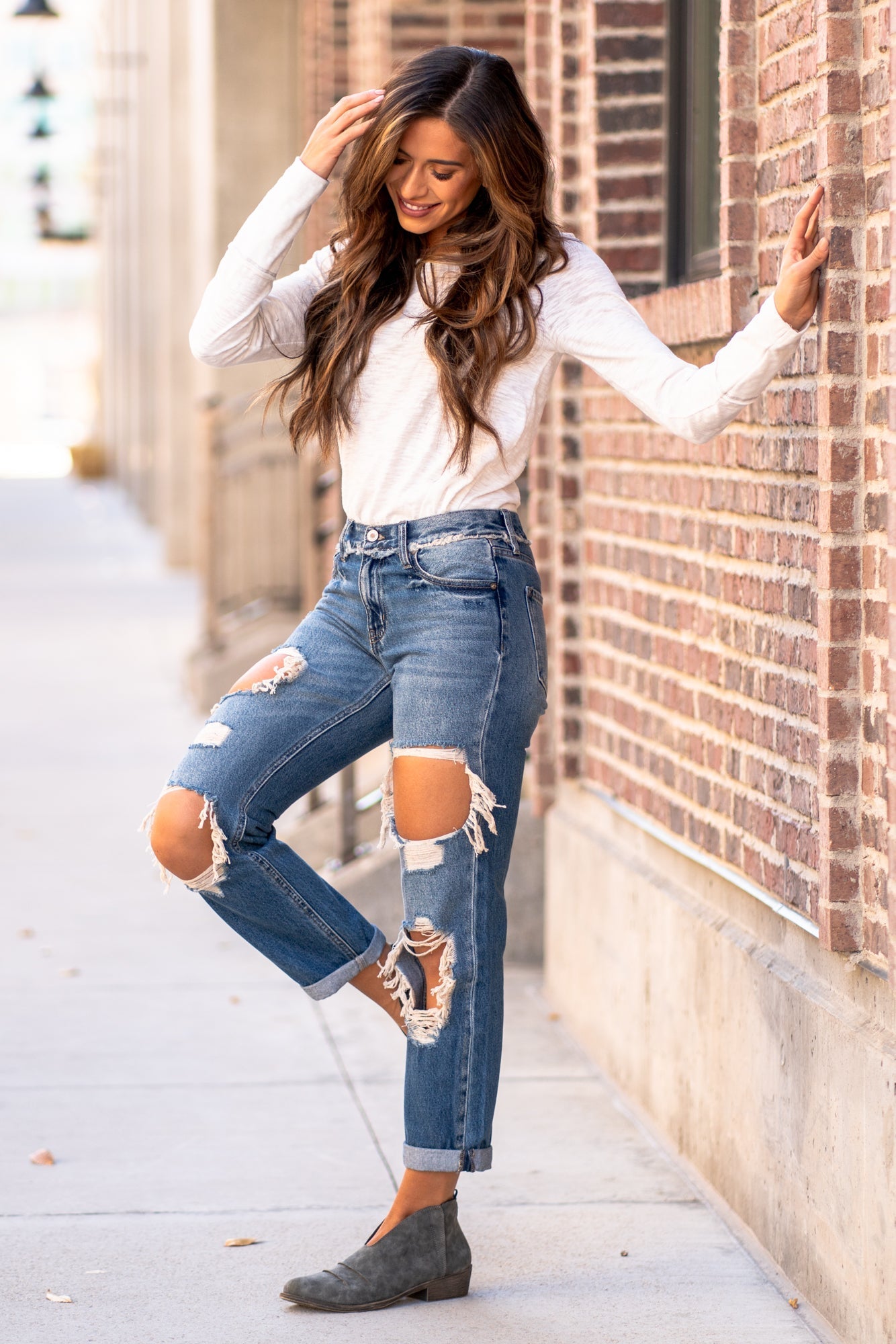  KanCan Jeans  These mid-rise boyfriend jeans hit at exactly the right spot on your waist. With 100% cotton and no stretch, these will mold to your body as you wear   KanCan Stretch Level: Comfort Stretch   Color: Medium Blue Wash Cut: Boyfriend, 27" Inseam Rise: Mid-Rise, 9" Front Rise 100% Cotton Stitching: Classic  Fly: Zipper Style #: KC70010M Contact us for any additional measurements or sizing. 