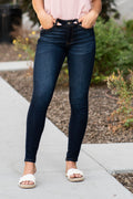 KanCan Jeans Collection: Core Style  Color: Dark Wash Cut: Skinny, 29.5" Inseam  Rise: Mid-Rise, 8.5" Front Rise 67% COTTON 25% POLYESTER 7% RAYON Stitching: Classic Fly: Zipper Style #: KC7092 Contact us for any additional measurements or sizing