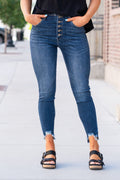 KanCan Jeans Color: Dark Wash Ankle Skinny, 27" Inseam* High Rise, 11" Front Rise* Frayed Hem Ankle with Ripped Distress 93% COTTON, 6% POLYESTER, 1% SPANDEX Fly: Exposed Button Fly Style #: KC2517D Contact us for any additional measurements or sizing.    *Measured on the smallest size, measurements may vary by size. 