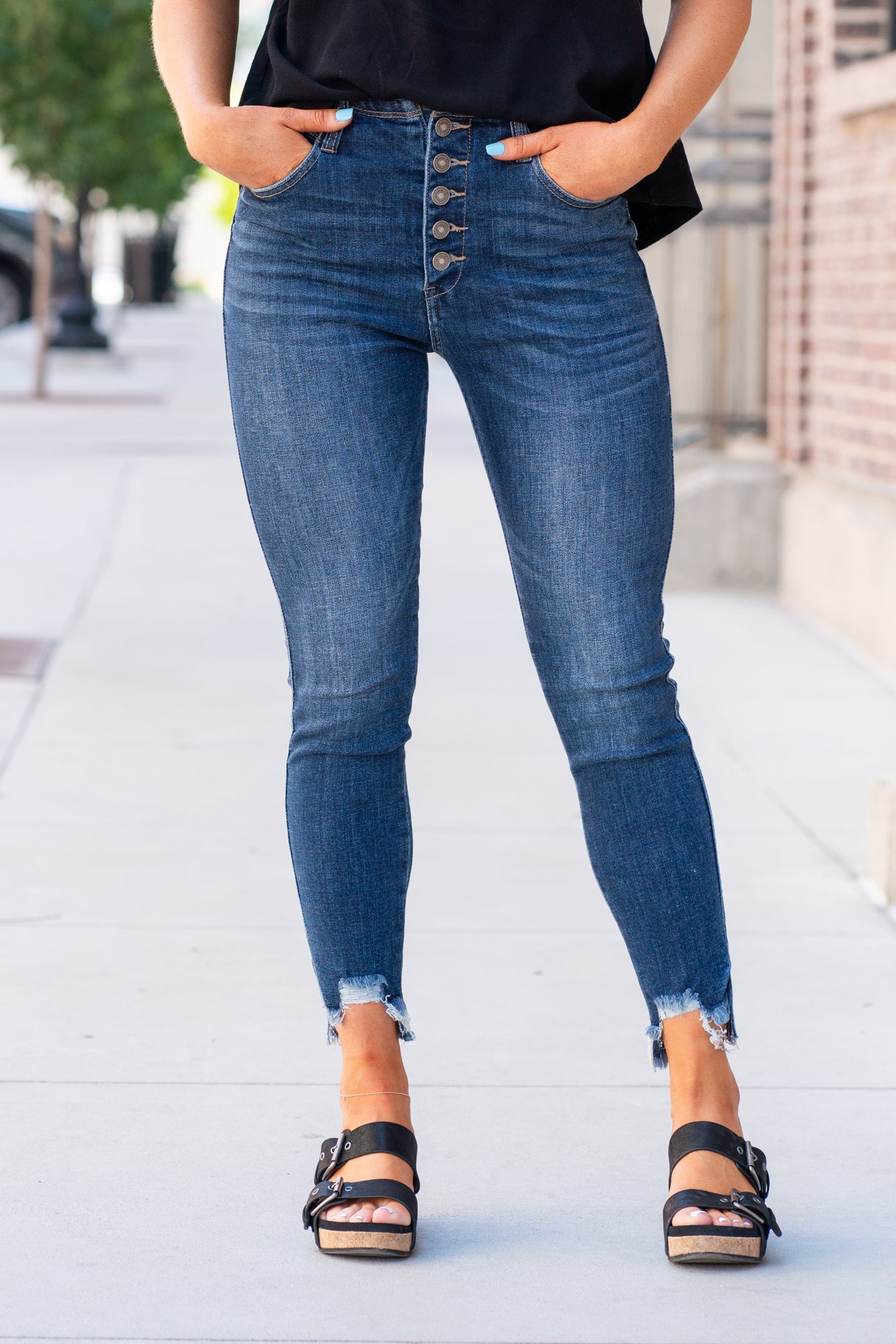 KanCan Jeans Color: Dark Wash Ankle Skinny, 27" Inseam* High Rise, 11" Front Rise* Frayed Hem Ankle with Ripped Distress 93% COTTON, 6% POLYESTER, 1% SPANDEX Fly: Exposed Button Fly Style #: KC2517D Contact us for any additional measurements or sizing.    *Measured on the smallest size, measurements may vary by size. 