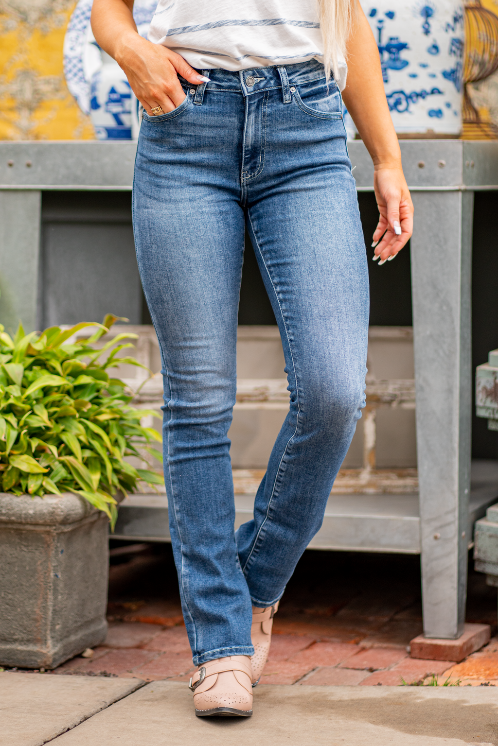 KanCan Jeans  KanCan Stretch Level: Stretchy  Color: Medium Blue Cut: Boot Cut, 32" Inseam* Rise: High-Rise, 10" Front Rise* 68% COTTON, 30% POLYESTER, 2%SPANDEX Stitching: Classic  Fly: Zipper Style #: KC8683M  Contact us for any additional measurements or sizing.  *Measured on the smallest size, measurements may vary by size.