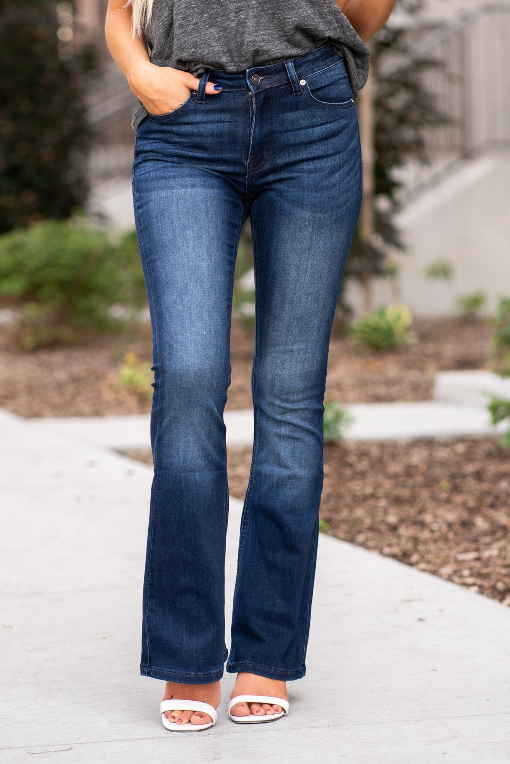 KanCan Jeans Collection: Core Style  Color: Dark Wash Cut: Flare, 31.5" Inseam  Rise: Mid-Rise, 9" Front Rise 54% COTTON 34% Rayon 10% POLYESTER 2% SPANDEX Fly: Zipper Style #: KC6102D-PT Contact us for any additional measurements or sizing.  Haley wears a size small top, a 1 in jeans and a small in tops. She is wearing a size 24/1 in these jeans.