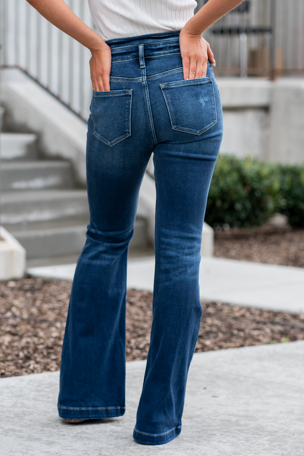 KanCan Jeans   KanCan Stretch Level: Comfort Stretch  Curvy Fit Flare   Color: Dark Blue Wash Cut: Flare, 33" Inseam  Rise: High Rise, 11" Front Rise 95% COTTON, 4% POLYESTER, 1% LYCRA Fly: Exposed Button Fly Style #: KC8602D-CV Contact us for any additional measurements or sizing.  *Measured on the smallest size, measurements may vary by size. 
