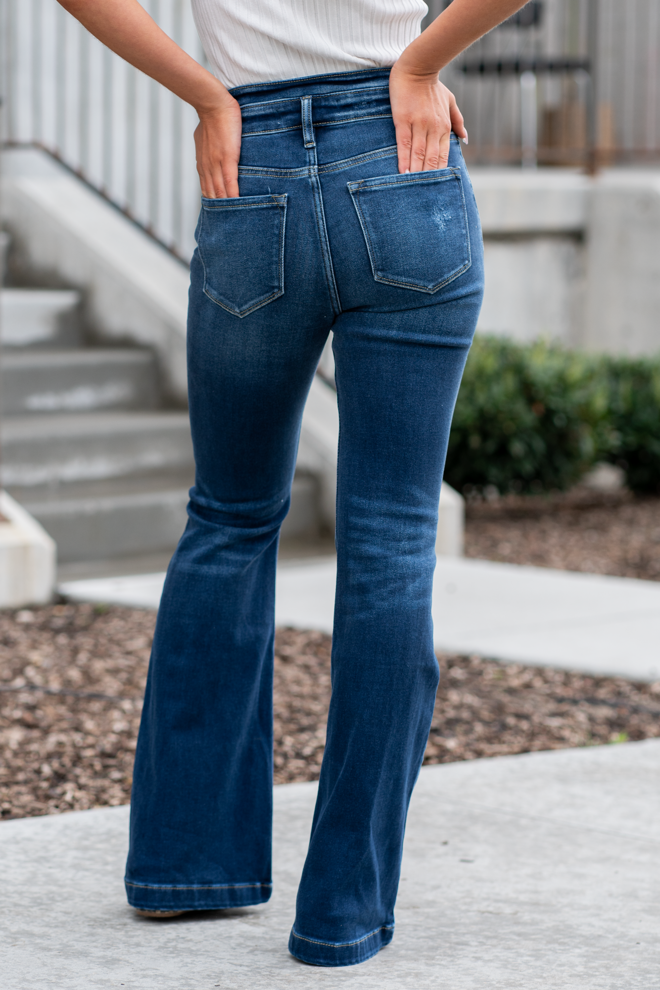 KanCan Jeans   KanCan Stretch Level: Comfort Stretch  Curvy Fit Flare   Color: Dark Blue Wash Cut: Flare, 33" Inseam  Rise: High Rise, 11" Front Rise 95% COTTON, 4% POLYESTER, 1% LYCRA Fly: Exposed Button Fly Style #: KC8602D-CV Contact us for any additional measurements or sizing.  *Measured on the smallest size, measurements may vary by size. 