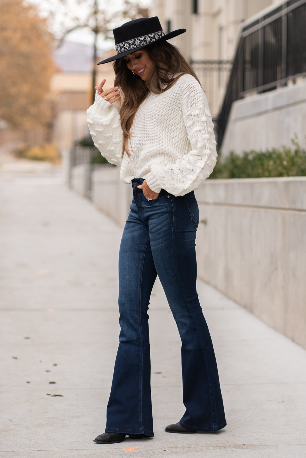KanCan Jeans Collection: Core Style  Color: Dark Wash Cut: Flare, 33.75" Inseam  Rise: Mid-Rise, 9" Front Rise 54% 54% COTTON 34% Rayon 10% POLYESTER 2% SPANDEX Fly: Zipper Style #: KC6102D Contact us for any additional measurements or sizing.  Taylor is 5'7" and wears a size 4 in jeans, small top and an 8.5 in shoes. She is wearing a size size 25/3 in these jeans.