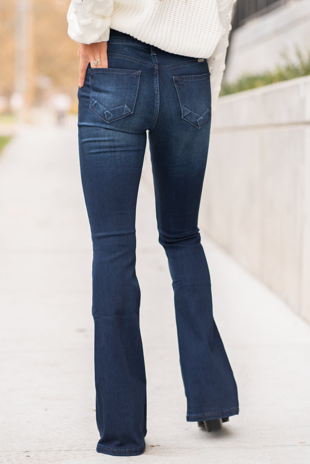 KanCan Jeans Collection: Core Style  Color: Dark Wash Cut: Flare, 33.75" Inseam  Rise: Mid-Rise, 9" Front Rise 54% 54% COTTON 34% Rayon 10% POLYESTER 2% SPANDEX Fly: Zipper Style #: KC6102D Contact us for any additional measurements or sizing.  Taylor is 5'7" and wears a size 4 in jeans, small top and an 8.5 in shoes. She is wearing a size size 25/3 in these jeans.