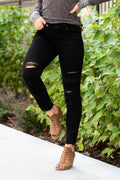 KanCan Jeans Color: Black Cut: Skinny, 27" Inseam Rise: Mid-Rise, 8.5" Front Rise 50% COTTON , 28% POLYESTER , 21% RAYON , 1% SPANDEX Stitching: Classic Fly: Zipper Style #: KC5056BK Contact us for any additional measurements or sizing.  